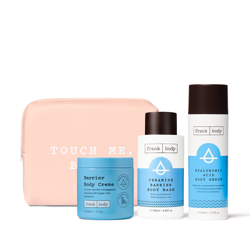 The frank body Sip & Slather Kit: Barrier Body Creme, Ceramide Barrier Body Wash and Hyaluronic Acid Body Serum with a pink Touch Me Babe pouch.